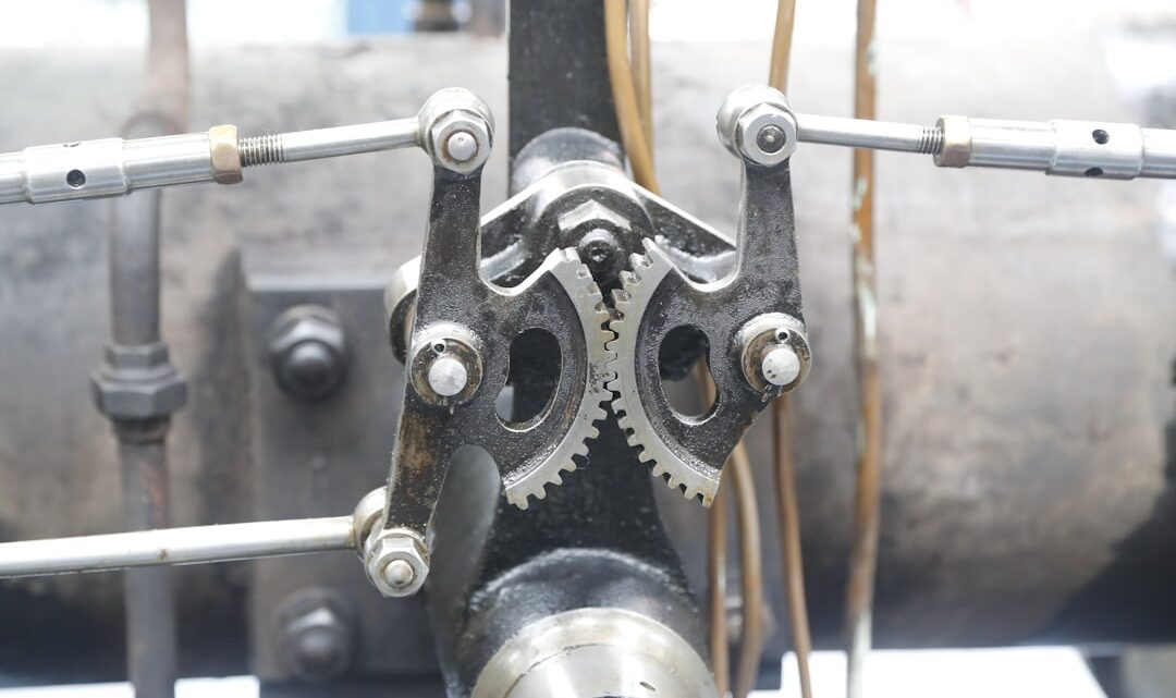 Uma Visao De Perto De Uma Maquina Com Engrenagens Wqc_tlCmzHI