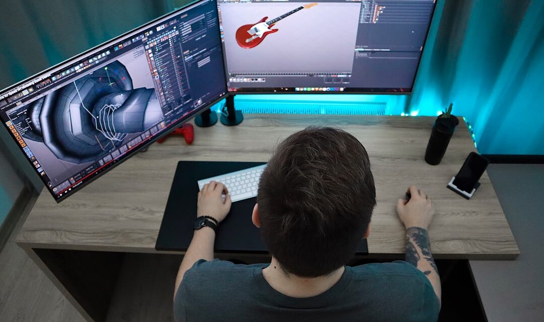 Homem Sentado E Usando O Computador F5j A8M1KEw