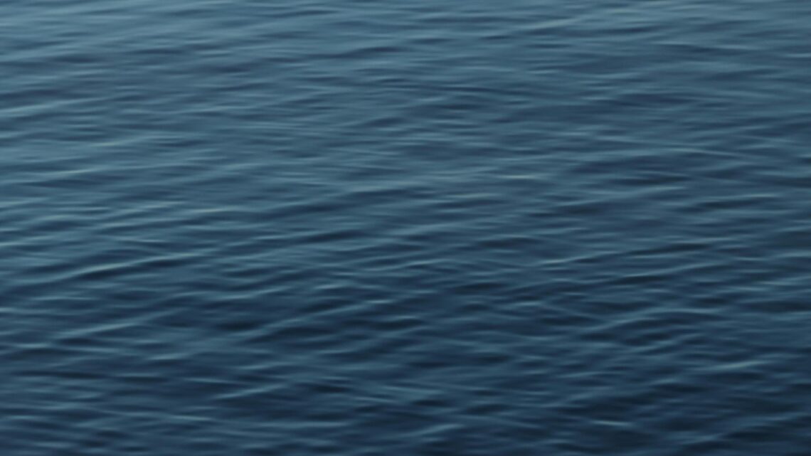 Calm and rippled water surface in Jönköping, highlighting serene nature.