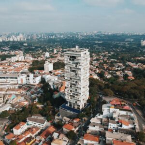 High-angle aerial shot of São Paulo showcasing urban architecture and greenery.