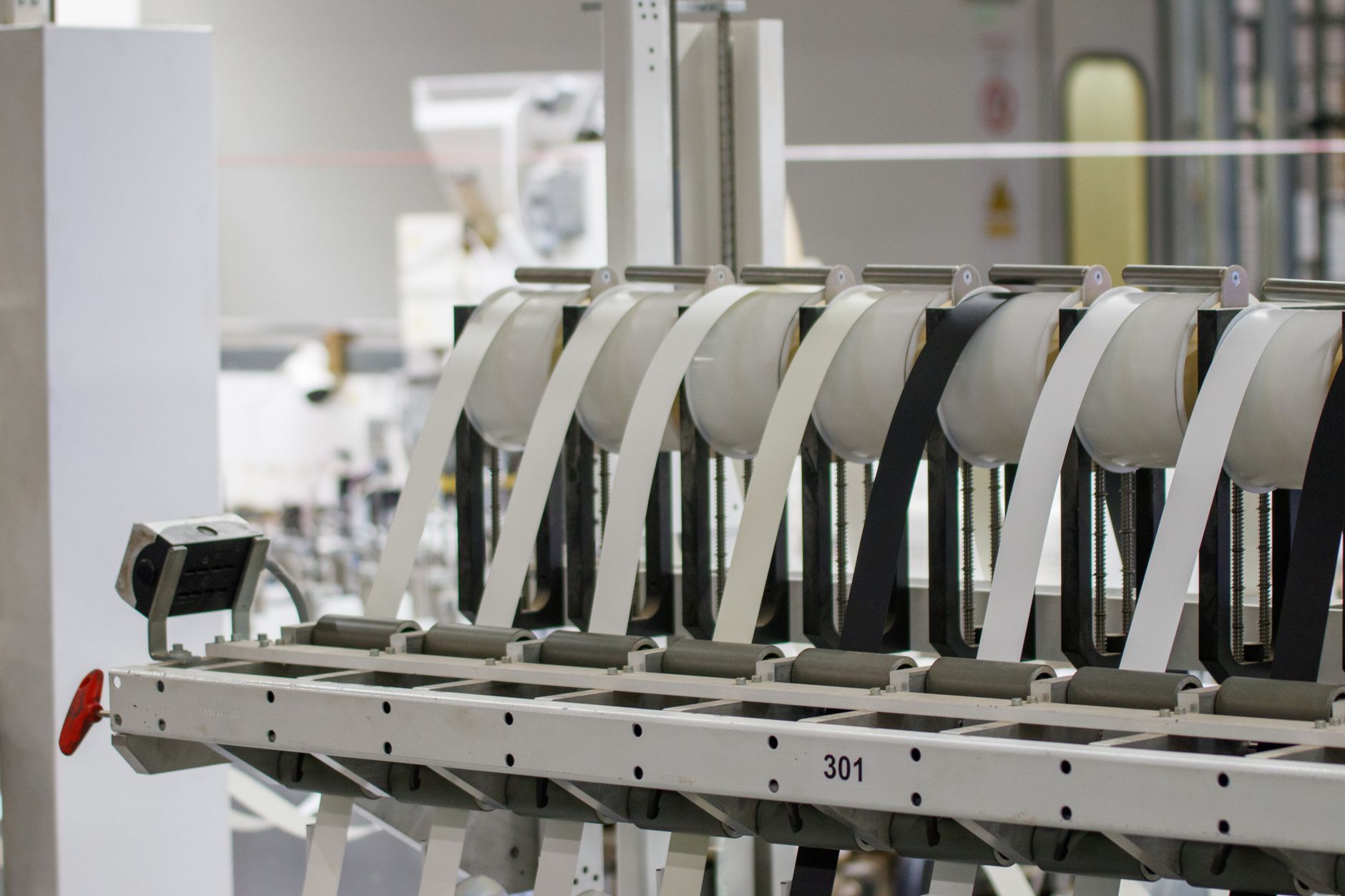 Modern industrial machine in operation in a manufacturing facility showcasing advanced technology.
