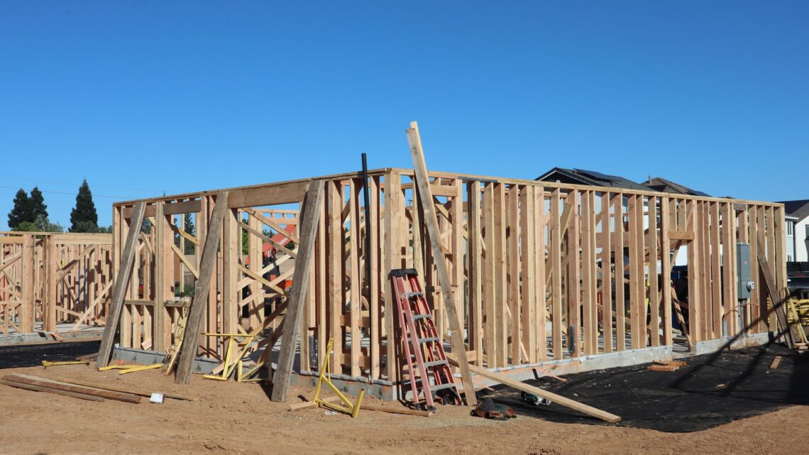 Framing stages of new home construction in sunny Elk Grove, California.